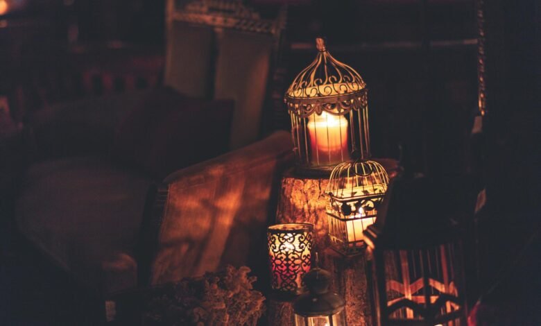 photo of candles inside cages